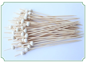 Close-up of 12cm bamboo fruit picks featuring decorative white round beads on top
