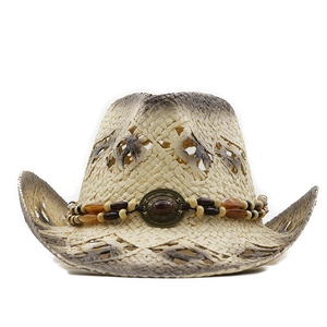 Detail of hollow straw cowboy hat featuring wooden beads and red turquoise stone