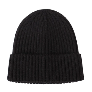 Close-up of thick ribbed knit texture on a black winter beanie hat for kids