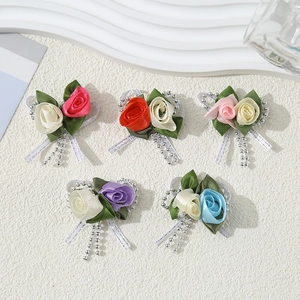 Handmade ribbon rose brooches set in five pastel colors with decorative bead accents