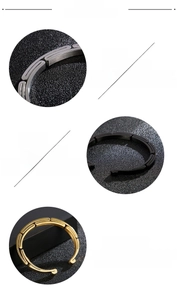 Detailed macro view of 316L stainless steel H-link bracelet in silver, gold and black