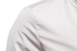 Detailed macro view of high-quality stitching on white jacket shoulder and collar line