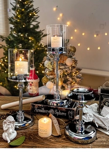 Three-piece silver metal candle holders with glass windproof covers and white candles
