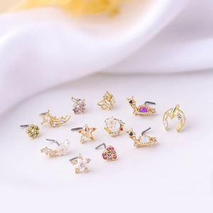 12-piece set of gold stainless steel nose studs with colorful zircon butterfly and flower charms