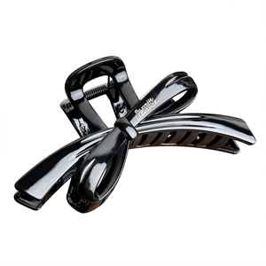 Large black ribbon bow hair claw clip with Barrette La France silver lettering