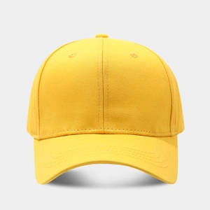 Close-up of yellow baseball cap showing durable cotton fabric and reinforced stitching