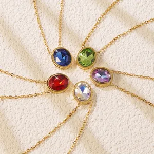 Set of five gold necklaces with colorful oval-cut gemstones in a circular display