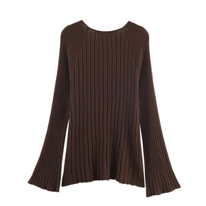 Close-up of deep brown ribbed knit sweater featuring vertical texture and slim crewneck