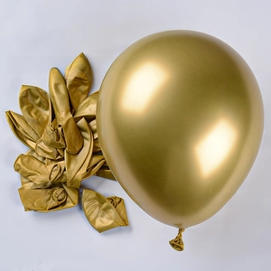 Macro detail of metallic gold latex balloons showing chrome finish and reflective texture