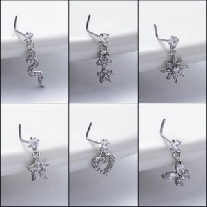 L-shaped stainless steel nose studs with zirconia pendants in snake and star designs