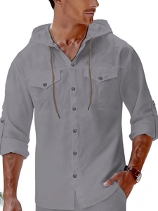 Close-up of grey men's linen hoodie shirt showing buttons and chest pockets detail