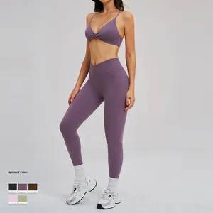 Set yoga viola da donna con reggiseno sportivo a spalline e leggings a vita alta sport