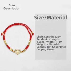 Detail of 22cm red braided bracelet with 18k gold plated Virgin Mary heart charm and zircons