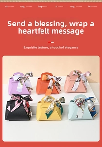 Macro detail of leather wedding gift bags with elegant scarf handles in assorted colors