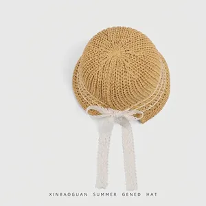 Breathable hollow knit sun hat with elegant lace ribbon for women in beige