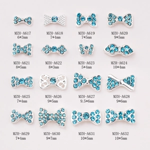Blue bow nail charms set with silver alloy and rhinestones for 3D manicures
