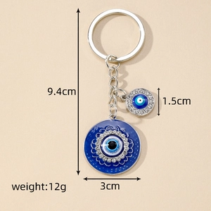 Porte-clés œil maléfique vintage avec émail bleu et cristaux blancs en alliage d'argent