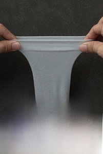 Detail of grey silk business sock showing 6x high elasticity and 3D heel construction