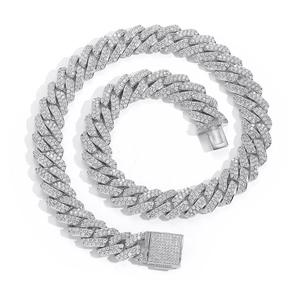 Close-up of a silver Cuban link chain with double-row micro-pave cubic zirconia stones