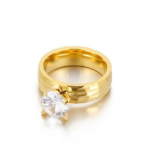 Golden 6mm ring with hammered texture and large square-cut zirconia center stone
