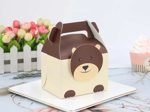 Detail of bear cartoon gift box with handle and brown cream pattern for sweets