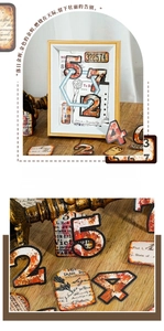 Macro shot of vintage industrial style numeric stickers with antique gold foil accents
