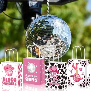 Disco Cowgirl party gift bags set with disco ball, cowboy hat and pink cow print patterns