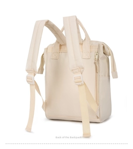 Back view of beige waterproof mommy backpack featuring padded straps and side zipper pockets
