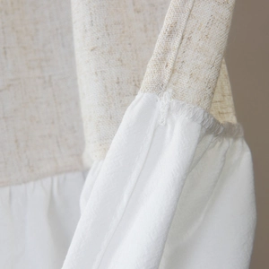 Detail of American retro coffee curtain with beige linen and white cotton stitching