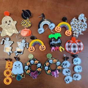 Exaggerated acrylic Halloween earrings featuring spooky pumpkin and sunflower designs
