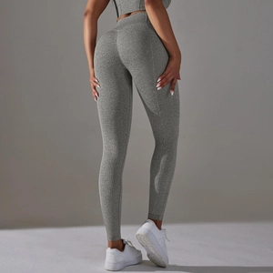 Close-up of heather grey high waisted yoga leggings showing seamless knitted texture and lifting