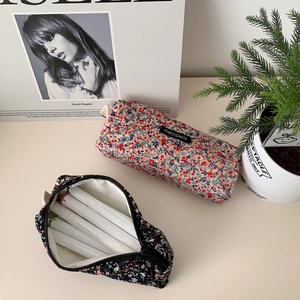 Detailed view of floral corduroy pencil cases with zippers and large capacity storage