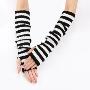 Close-up of black and white striped knit arm warmers with fingerless design