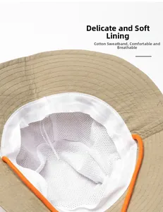 Detail of khaki outdoor hat featuring breathable mesh lining and soft cotton sweatband