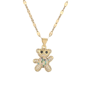 Golden necklace with a 3D teddy bear pendant featuring colorful pavé-set zircon stones
