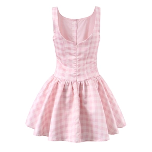Detail of pink and white plaid sleeveless dress showing back zipper and waist design