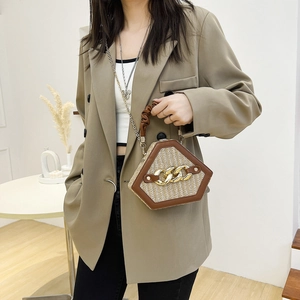 Chic beige woven hexagonal shell bag with brown leather handles and gold chain