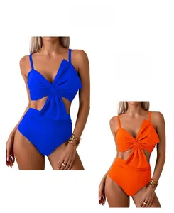 Detail of high waist bikini sets in royal blue and bright orange with front bow knot design
