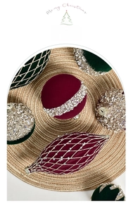 Detail of burgundy and emerald flocked Christmas ornaments with hand-painted sequins
