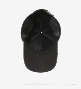 Detail view of thickened winter hat interior lining with ear protection and cross-stitching