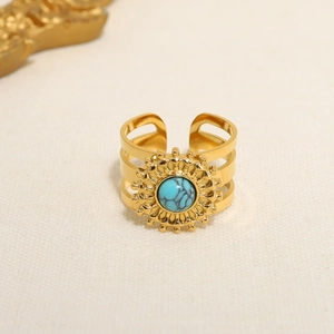 Retro gold titanium steel ring featuring sunburst design with green natural stone