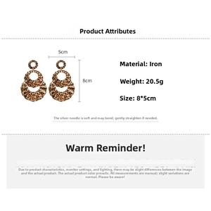 Detail view of triple-layered leopard print earrings with iron material and 925 silver needle
