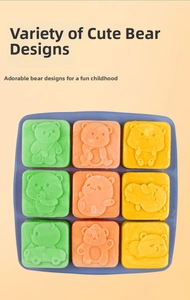 Detail showing nine colorful bear-shaped silicone cake molds in blue tray