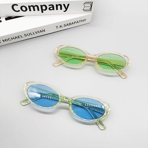 Stylish 2025 small oval frame sunglasses in jelly green and blue colors for women