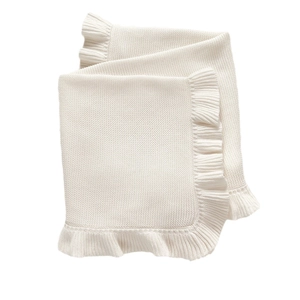 Knitted baby blanket with ruffles made of pure cotton in creamy white for strollers