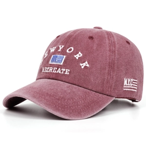 Close-up of vintage washed cotton baseball cap featuring high-quality New York embroidery