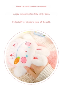 Detail of cute plush rabbit hand warmer featuring soft embroidery and pocket design