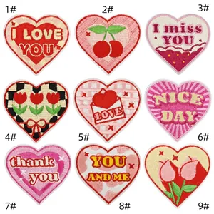 Set of 9 heart-shaped embroidered patches with floral and letter patterns for clothing
