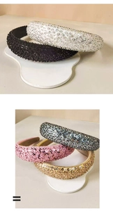 Close-up of sparkling sequin headbands with metallic beads in various elegant colors