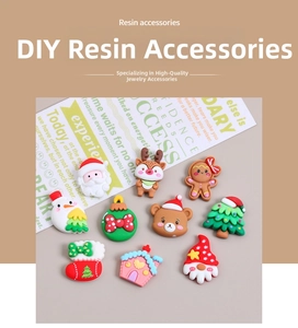 Detailed flat lay of Christmas resin DIY charms including Santa and snowman ornaments